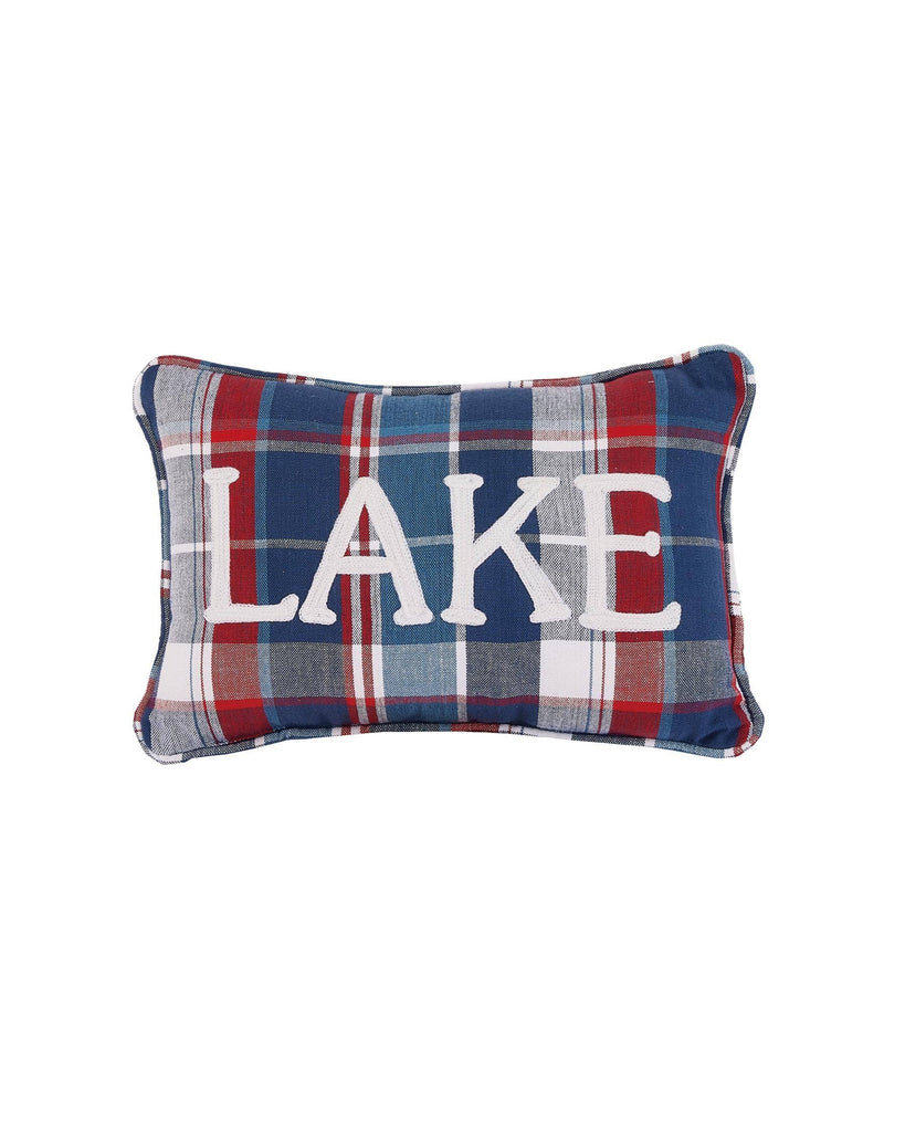 Plaid pillow with 'LAKE' text on a white background